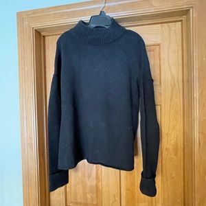 Black open back mock turtleneck sweater